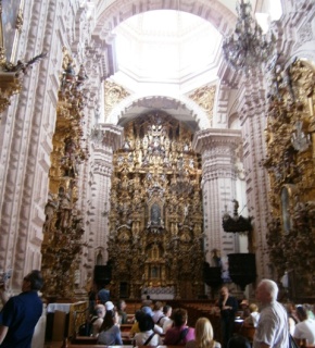 The main altar portrays the Immaculate Conception.
